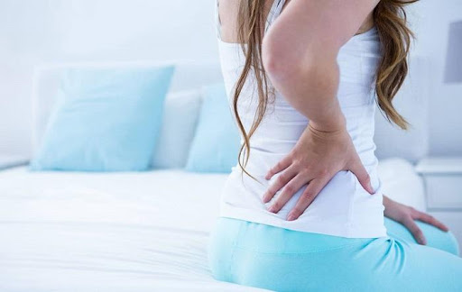 đau lưng là dấu hiệu nhất biết có thai sớm
